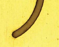 FIGURE 3c. Laser etched stainless steel cleaned in ultrasonic bath. FIGURE 3c. Laser etched stainless steel cleaned in ultrasonic bath.