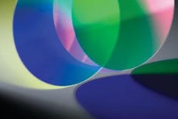 These 200 mm coated wafers will get cut into individual fluorescent filters. These 200 mm coated wafers will get cut into individual fluorescent filters.