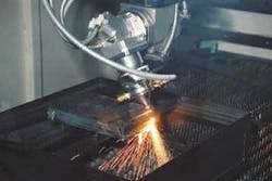 Figure 1. Laser head on a five-axis system. Figure 1. Laser head on a five-axis system.