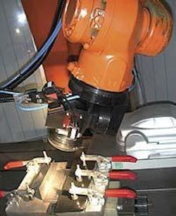 Figure 1. The Coupled Axes System is made up of robot and beam deflection optics for Nd:YAG laser beams up to 4 kW. Figure 1. The Coupled Axes System is made up of robot and beam deflection optics for Nd:YAG laser beams up to 4 kW.