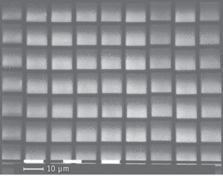 FIGURE 1. Imaged with scanning-electron microscopy, this optical surface, used in the Lobster x-ray telescope, includes microchannels. The light squares are open channels, each about 10 &micro;m wide, which is similar to the size of channels in an actual lobster&rsquo;s eye.