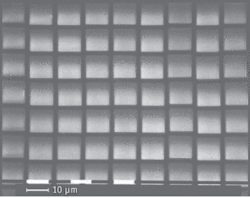FIGURE 1. Imaged with scanning-electron microscopy, this optical surface, used in the Lobster x-ray telescope, includes microchannels. The light squares are open channels, each about 10 µm wide, which is similar to the size of channels in an actual lobster’s eye. FIGURE 1. Imaged with scanning-electron microscopy, this optical surface, used in the Lobster x-ray telescope, includes microchannels. The light squares are open channels, each about 10 µm wide, which is similar to the size of channels in an actual lobster’s eye.