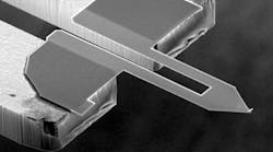 FIGURE 1. The cantilever and sharp tip span the tines of a quartz tuning fork in the Akiyama-probe resonant surface-probe sensor. The tines vibrate in an opposing motion while the cantilever vibrates perpendicular to the tine motion. FIGURE 1. The cantilever and sharp tip span the tines of a quartz tuning fork in the Akiyama-probe resonant surface-probe sensor. The tines vibrate in an opposing motion while the cantilever vibrates perpendicular to the tine motion.