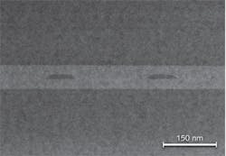 FIGURE 1. A transmission electron micrograph shows the Brightlock monolithic diffraction-grating spectral control layer within a high-power laser diode. FIGURE 1. A transmission electron micrograph shows the Brightlock monolithic diffraction-grating spectral control layer within a high-power laser diode.