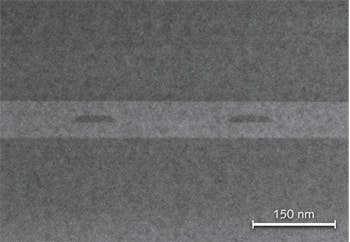 FIGURE 1. A transmission electron micrograph shows the Brightlock monolithic diffraction-grating spectral control layer within a high-power laser diode.