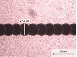 FIGURE 2. In the manufacture of thin-film solar panels with Q-switched DPSS lasers, the high pulse repetition rate and pulse-to-pulse stability of nanosecond micromachining lasers like the Coherent AVIA series are critical to producing clean scribes with the uniform scalloped profile that is needed for certain technical reasons. This image shows a 'P2' scribe performed at 532 nm. FIGURE 2. In the manufacture of thin-film solar panels with Q-switched DPSS lasers, the high pulse repetition rate and pulse-to-pulse stability of nanosecond micromachining lasers like the Coherent AVIA series are critical to producing clean scribes with the uniform scalloped profile that is needed for certain technical reasons. This image shows a 'P2' scribe performed at 532 nm.