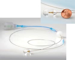 FIGURE 2. By manipulating a plastic ball (right side) attached to a driveshaft sheath that encloses a flexible fiber-optic tether, a physician can control the position of an imaging endomicroscopy capsule (inset) in a patient&apos;s esophagus.