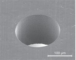 FIGURE 3. A typical hole (200 μm diameter and 250 μm thickness) can be made in FIGURE 3. A typical hole (200 μm diameter and 250 μm thickness) can be made in