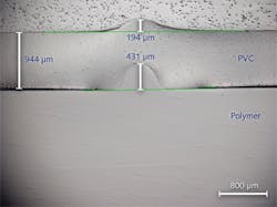 FIGURE 4. The cross-section of a weld between dissimilar polymers (an amorphous rigid polymer and a flexible PVC) is shown using a 120 W Tm-doped mid-IR fiber laser. The weld was strong and caused the PVC material to fail when the bond was tested. FIGURE 4. The cross-section of a weld between dissimilar polymers (an amorphous rigid polymer and a flexible PVC) is shown using a 120 W Tm-doped mid-IR fiber laser. The weld was strong and caused the PVC material to fail when the bond was tested.