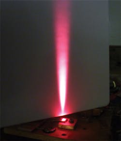 FIGURE 3. A VCSEL emits in the red. These emitters can be combined into arrays emitting up to 40 W. FIGURE 3. A VCSEL emits in the red. These emitters can be combined into arrays emitting up to 40 W.