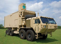 FIGURE 1. The U.S. Army&apos;s high-energy-laser mobile demonstrator (HEL-MD) shot down targets with a 10 kW fiber laser in tests at White Sands and Eglin AFB in Florida. Boeing supplied the acquisition, tracking, and beam-delivery optics that fire a beam through the portal on top of the Army&apos;s heavy expanded mobility tactical truck (HEMTT). Boeing will install a 60 kW laser for further tests.