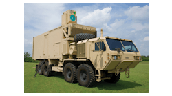 FIGURE 1. The U.S. Army&apos;s high-energy-laser mobile demonstrator (HEL-MD) shot down targets with a 10 kW fiber laser in tests at White Sands and Eglin AFB in Florida. Boeing supplied the acquisition, tracking, and beam-delivery optics that fire a beam through the portal on top of the Army&apos;s heavy expanded mobility tactical truck (HEMTT). Boeing will install a 60 kW laser for further tests.