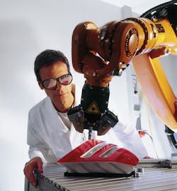 FIGURE 1. Laservision's T5K11 eyewear can be used for multiple laser applications, including infrared welding of an automotive tail light assembly with a 1064 nm Class 4 Nd:YAG laser. FIGURE 1. Laservision's T5K11 eyewear can be used for multiple laser applications, including infrared welding of an automotive tail light assembly with a 1064 nm Class 4 Nd:YAG laser.