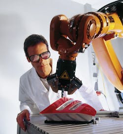 FIGURE 1. Laservision's T5K11 eyewear can be used for multiple laser applications, including infrared welding of an automotive tail light assembly with a 1064 nm Class 4 Nd:YAG laser. FIGURE 1. Laservision's T5K11 eyewear can be used for multiple laser applications, including infrared welding of an automotive tail light assembly with a 1064 nm Class 4 Nd:YAG laser.