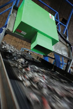 FIGURE 2. A prototype LIBS system for automatic scrap metal sorting is field-tested.