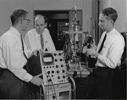 FIGURE 1. Robert N. Hall (center) with Gunther Fenner (left) and Jack Kingsley (right) at the General Electric Research &amp; Development Center, where they made the first laser diode in 1962.