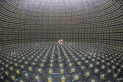 FIGURE 4. Water starts to fill the tank of the Super-Kamiokande neutrino observatory, covering some photomultipliers. FIGURE 4. Water starts to fill the tank of the Super-Kamiokande neutrino observatory, covering some photomultipliers.