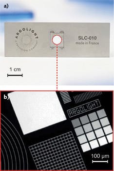 FIGURE 1. Typical calibration slide (75 × 25 × 1.5 mm) with fluorescent patterns engraved inside the glass (a) and widefield image (λexc = 365 nm, λem = 445±25 nm, 10X/0.3) of these fluorescent patterns induced by ultrashort laser lithography (b). FIGURE 1. Typical calibration slide (75 × 25 × 1.5 mm) with fluorescent patterns engraved inside the glass (a) and widefield image (λexc = 365 nm, λem = 445±25 nm, 10X/0.3) of these fluorescent patterns induced by ultrashort laser lithography (b).