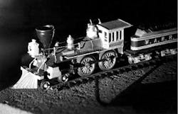 FIGURE 2. A 3D holographic image projected by a helium-neon laser in a Spectra-Physics hotel suite. FIGURE 2. A 3D holographic image projected by a helium-neon laser in a Spectra-Physics hotel suite.