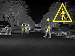 FIGURE 7. A far-infrared night-vision system in the 2009 BMW-7 series activates an alert when a man crosses the street. FIGURE 7. A far-infrared night-vision system in the 2009 BMW-7 series activates an alert when a man crosses the street.
