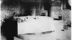 FIGURE 1. The Michelson-Morley experiment was performed on this slab in the basement of a stone dormitory at Western Reserve University in Cleveland. FIGURE 1. The Michelson-Morley experiment was performed on this slab in the basement of a stone dormitory at Western Reserve University in Cleveland.