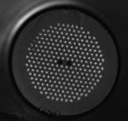 FIGURE 4. The PBG fiber structure is imaged under a microscope. The lighter regions are the germanium-doped rods that constitute the pump cladding, while the two darker regions are the boron rods. The pump-cladding structure is surrounded by an air cladding. FIGURE 4. The PBG fiber structure is imaged under a microscope. The lighter regions are the germanium-doped rods that constitute the pump cladding, while the two darker regions are the boron rods. The pump-cladding structure is surrounded by an air cladding.