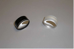 FIGURE 1. Large-diameter core fibers include a 200-&micro;m-core plastic-clad silica fiber (left) and a 20-&micro;m-core large-mode-area silica fiber (right). Automated test instrumentation is available to perform geometry measurements on these specialty types of fibers.