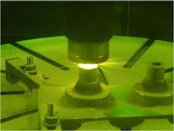 A rocket nozzle is made using a laser-deposition technique that allows for multiple metallic properties in the same object. This technique involves blowing multiple metal powders into a laser beam, so that the laser melts the powder and forms a small pool at the point where the laser touches the part that is being built. A rocket nozzle is made using a laser-deposition technique that allows for multiple metallic properties in the same object. This technique involves blowing multiple metal powders into a laser beam, so that the laser melts the powder and forms a small pool at the point where the laser touches the part that is being built.