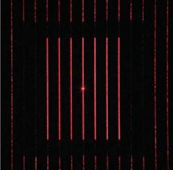 FIGURE 1. A CCD captures the image of a diffraction pattern with seven lines that is produced by a diffractive optical element. Each line consists of 301 spots and the area defined by the lines is 44 × 61 mm at a distance of 500 mm from the DOE. FIGURE 1. A CCD captures the image of a diffraction pattern with seven lines that is produced by a diffractive optical element. Each line consists of 301 spots and the area defined by the lines is 44 × 61 mm at a distance of 500 mm from the DOE.