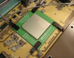 FIGURE 1. The optical IC package provides optical I/O within millimeters of the microchip. FIGURE 1. The optical IC package provides optical I/O within millimeters of the microchip.