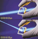 Liquid-crystal-based diffractive lens can be electrically switched on and off within 35 µs (left). Similar switchable holograms are capable of light deflection, spectral filtering, and distortion and aberration correction. The fastest electrically switchable hologram constructed to date has a switching speed of 10 µs. Associated software calculates many device characteristics, including diffraction efficiency over a range of input angles and wavelengths (right). The software is freely downloadable as an aid to optical designers.