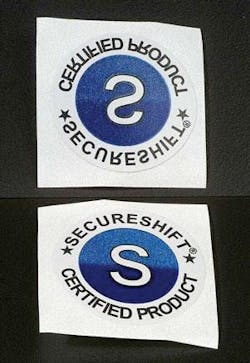 FIGURE 2. Phantom security labels introduced by JDS Uniphase in April rely on thin-film pigment technology and use brightness-shifting patterns that can be integrated into brand label designs. FIGURE 2. Phantom security labels introduced by JDS Uniphase in April rely on thin-film pigment technology and use brightness-shifting patterns that can be integrated into brand label designs.