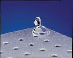 FIGURE 1. Lenses that do not have spherical surfaces can solve design problems such as the need for a low f number or a limited number of lenses in a system. FIGURE 1. Lenses that do not have spherical surfaces can solve design problems such as the need for a low f number or a limited number of lenses in a system.