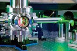 FIGURE 1. A cryogenically cooled Ti:sapphire laser amplifier crystal is pumped by a frequency-doubled Nd:YLF laser. FIGURE 1. A cryogenically cooled Ti:sapphire laser amplifier crystal is pumped by a frequency-doubled Nd:YLF laser.