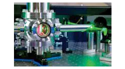 FIGURE 1. A cryogenically cooled Ti:sapphire laser amplifier crystal is pumped by a frequency-doubled Nd:YLF laser.