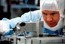 ASML's fourth-generation immersion lithography tool relies on a catadioptric lens design developed in collaboration with Carl Zeiss to achieve a numerical aperture of 1.2. ASML's fourth-generation immersion lithography tool relies on a catadioptric lens design developed in collaboration with Carl Zeiss to achieve a numerical aperture of 1.2.