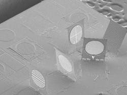 A silicon nitride beamsplitter (second element from right) is part of a lithographically fabricated optical system intended for use in an optical-storage pickup head. A silicon nitride beamsplitter (second element from right) is part of a lithographically fabricated optical system intended for use in an optical-storage pickup head.