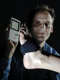 Optical engineer Vincent Crabtree holds a prototype PADD system. Optical engineer Vincent Crabtree holds a prototype PADD system.