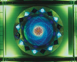 FIGURE 1. High-brightness LEDs have become intense enough for large-scale color applications, such as this display on a Royal Caribbean cruise ship. Aside from contained-space applications such as elevators and airline cabins, white-light LED systems for general illumination are still a few years away. FIGURE 1. High-brightness LEDs have become intense enough for large-scale color applications, such as this display on a Royal Caribbean cruise ship. Aside from contained-space applications such as elevators and airline cabins, white-light LED systems for general illumination are still a few years away.