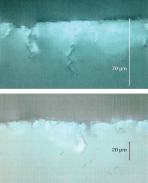 FIGURE 1. Surface quality is not a reliably predictable indicator of subsurface damage. The smoother and flatter surface in one sample (top) belies its much more extensive subsurface damage in comparison to a second sample (bottom). While some subsurface damage manifests itself as straight “pinholes” in the surface, cracks with the more characteristic “lightning bolt” shapes shown in these samples are impossible to probe visually or mechanically to their full depth. FIGURE 1. Surface quality is not a reliably predictable indicator of subsurface damage. The smoother and flatter surface in one sample (top) belies its much more extensive subsurface damage in comparison to a second sample (bottom). While some subsurface damage manifests itself as straight “pinholes” in the surface, cracks with the more characteristic “lightning bolt” shapes shown in these samples are impossible to probe visually or mechanically to their full depth.