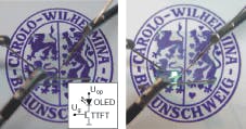 The seal of the Technical University of Braunschweig is seen through a transparent OLED device containing 10 pixels, one of them electrically connected in the power-off state (left) and switched on (right). The seal of the Technical University of Braunschweig is seen through a transparent OLED device containing 10 pixels, one of them electrically connected in the power-off state (left) and switched on (right).