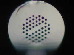 When the remaining holes are pressurized and a section of the fiber heated, the unpressurized holes in that section collapse. When the remaining holes are pressurized and a section of the fiber heated, the unpressurized holes in that section collapse.