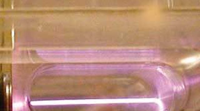 A 40 TW Ti:sapphire laser beam accelerates electrons in plasma within a capillary tube.