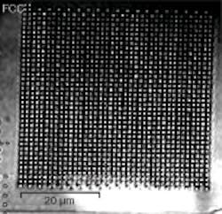 FIGURE 4. A face-centered-cubic (FCC) photonic crystal is fabricated in lithium niobate with ultrafast-laser pulses; the pulses cause microexplosions that create voids in the material.