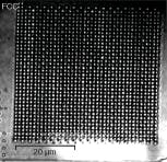 FIGURE 4. A face-centered-cubic (FCC) photonic crystal is fabricated in lithium niobate with ultrafast-laser pulses; the pulses cause microexplosions that create voids in the material.