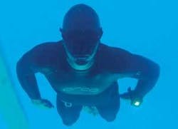 FIGURE 2a. Divers need brightly lit watch displays to monitor their time underwater. FIGURE 2a. Divers need brightly lit watch displays to monitor their time underwater.