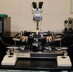 FIGURE 2. For multichannel waveguide alignment in which input and output faces have 8° facets, the translation stage must be offset with the same angle. FIGURE 2. For multichannel waveguide alignment in which input and output faces have 8° facets, the translation stage must be offset with the same angle.