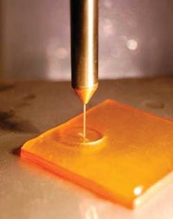 An abrasive-filled fluid jet polishes an optical surface in a predictable, controllable manner. An abrasive-filled fluid jet polishes an optical surface in a predictable, controllable manner.