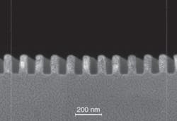 A scanning-electron-microscope image of a nanowire-grid DUV polarizer shows its 40 nm linewidth and 118 nm pitch (center-to-center line spacing), which enables the device to achieve a 65% transmittance and 200:1 extinction ratio at 266 nm. A scanning-electron-microscope image of a nanowire-grid DUV polarizer shows its 40 nm linewidth and 118 nm pitch (center-to-center line spacing), which enables the device to achieve a 65% transmittance and 200:1 extinction ratio at 266 nm.