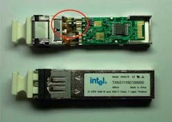 FIGURE 4. A transceiver made with a Ge photodetector (circled in red) demonstrated performance parity with commercially available GaAs-based detectors. FIGURE 4. A transceiver made with a Ge photodetector (circled in red) demonstrated performance parity with commercially available GaAs-based detectors.